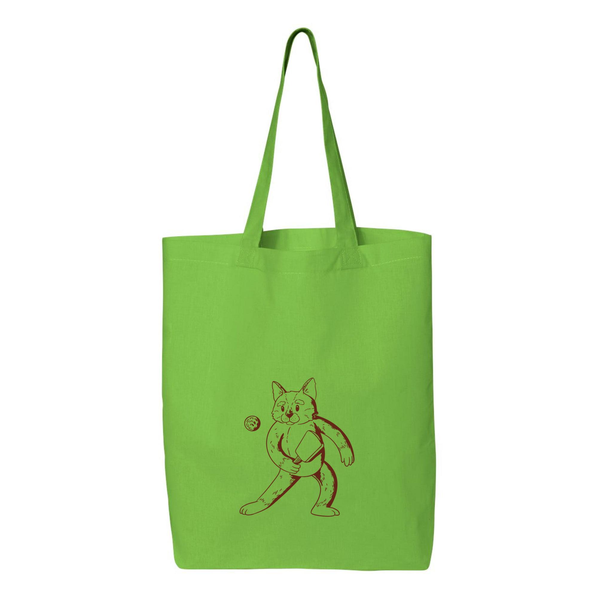 Black And White Drawing Of A Cat Holding A Tennis Ball Canvas Tote Bag 